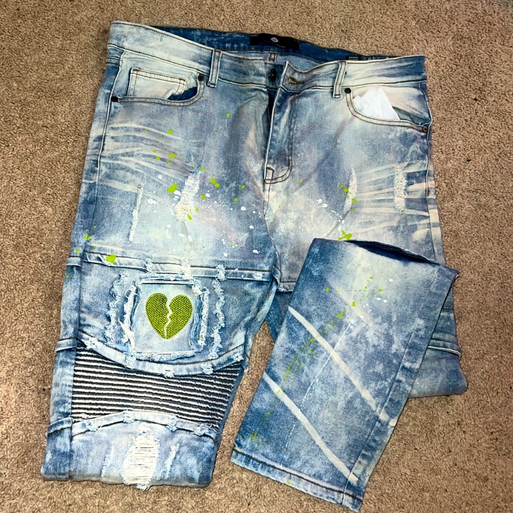 Blue jeans pants with broken heart